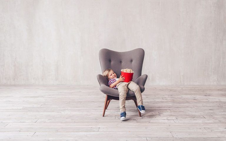 smiling-child-with-popcorn-at-home-2021-08-26-15-47-55-utc.jpg